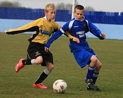 Shenfield and Gunnersbury footballers battle for possession