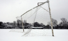 Snow covered football pitch
