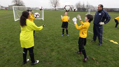 Children being coached football