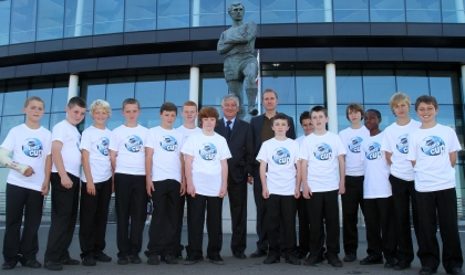 FA Chairman David Bernstein with John Scales and pupils from Cardinal Heenan School and Lancaster School